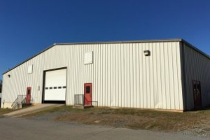 Cattle barns building with a closing the door
